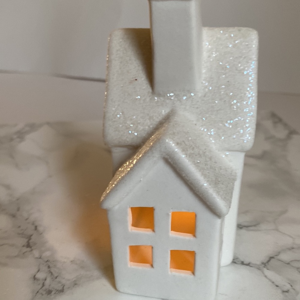 White ceramic mixture house with glitter top. Give the look of snow on rooftop.